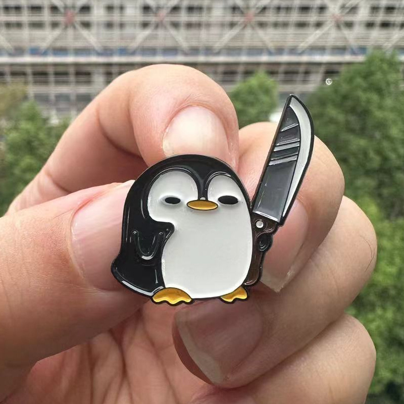 Zabawny pingwin trzymający duż – Edc Everyday Carry Knives recenzja i cena